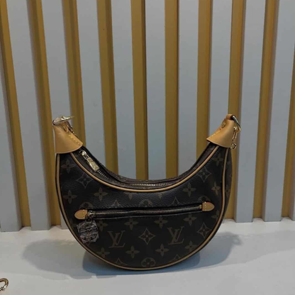 LOUIS VUITTON – SAC À BÉBÉ COOKIE