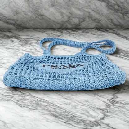 Sac cabas Prada en raphia avec logo tissé – bleu