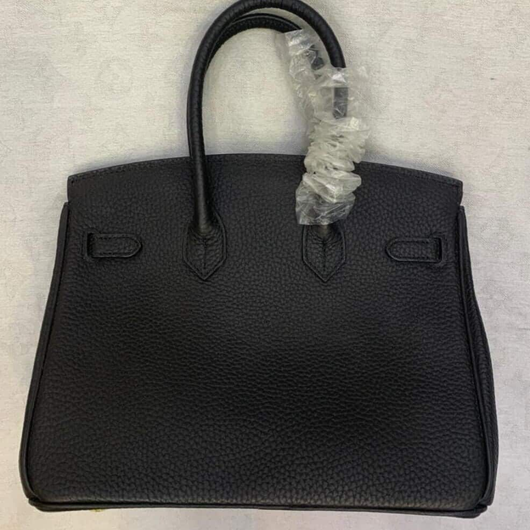 Sac Hermès Birkin 25 avec finitions dorées, coloris noir