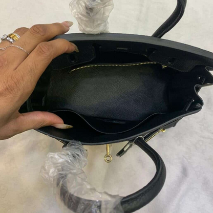 Sac Hermès Birkin 25 avec finitions dorées, coloris noir