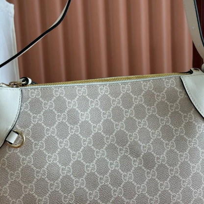 PETIT SAC À BANDOULIÈRE AVEC EMBLÈME GG