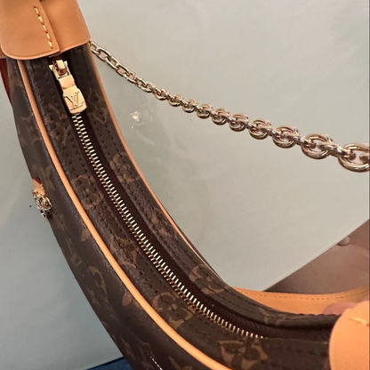 LOUIS VUITTON – SAC À BÉBÉ COOKIE